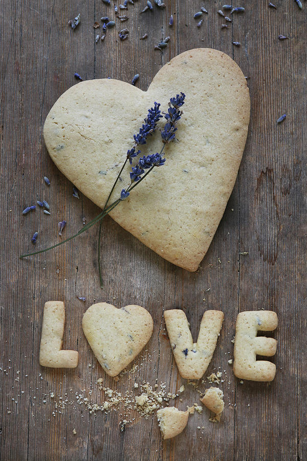 A Heart-shaped, Gluten-free Shortbread Biscuit With Lavender And The Word love Photograph by Regina Hippel