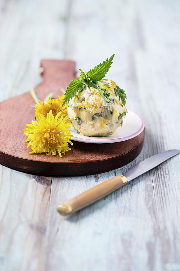 A Herb Butter Ball With Dandelions, Nettles And Chives Photograph by Mandy Reschke