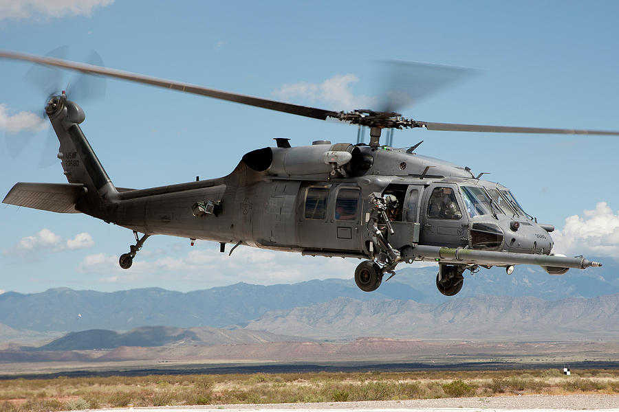 A Hh-60g Pavehawk Conducting A Training Photograph By Erik Roelofs 