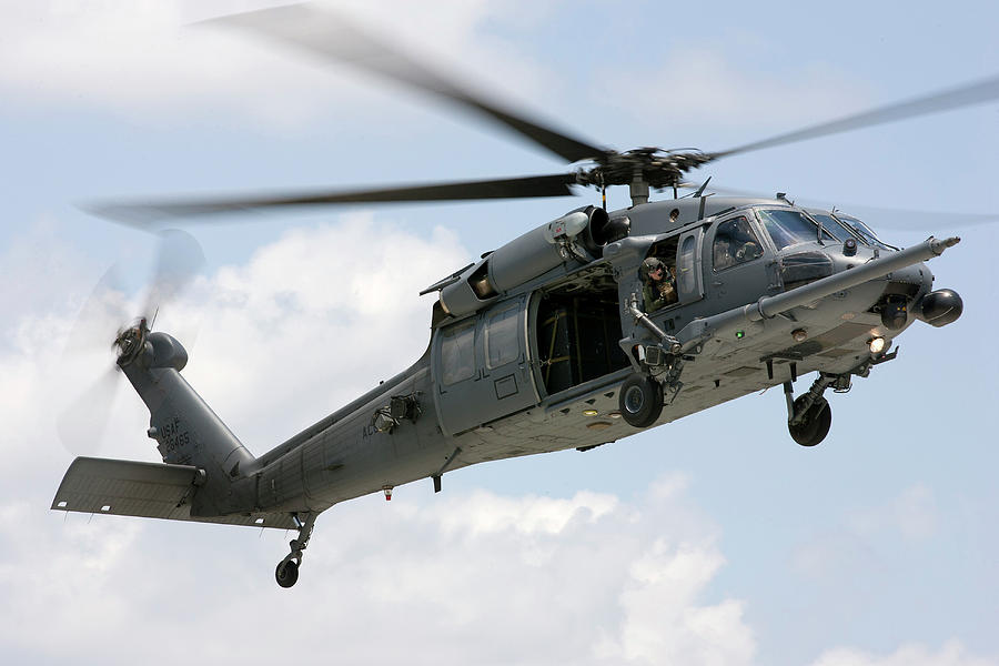 A Hh-60g Pavehawk Helicopter Prepares Photograph by Erik Roelofs - Pixels