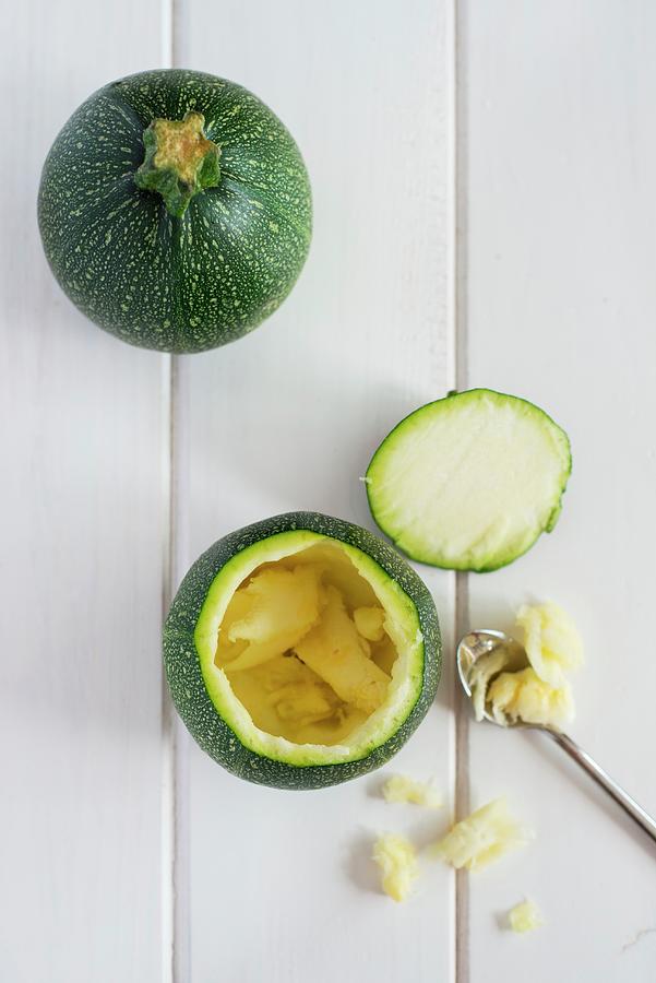 A Hollowed Out Courgette Ready To Stuff Photograph by Sonia Chatelain