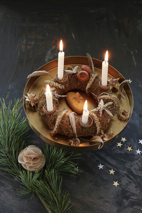 A Homemade Advent Wreath With Burning Candles On A Golden Cake Stand Photograph by Regina Hippel