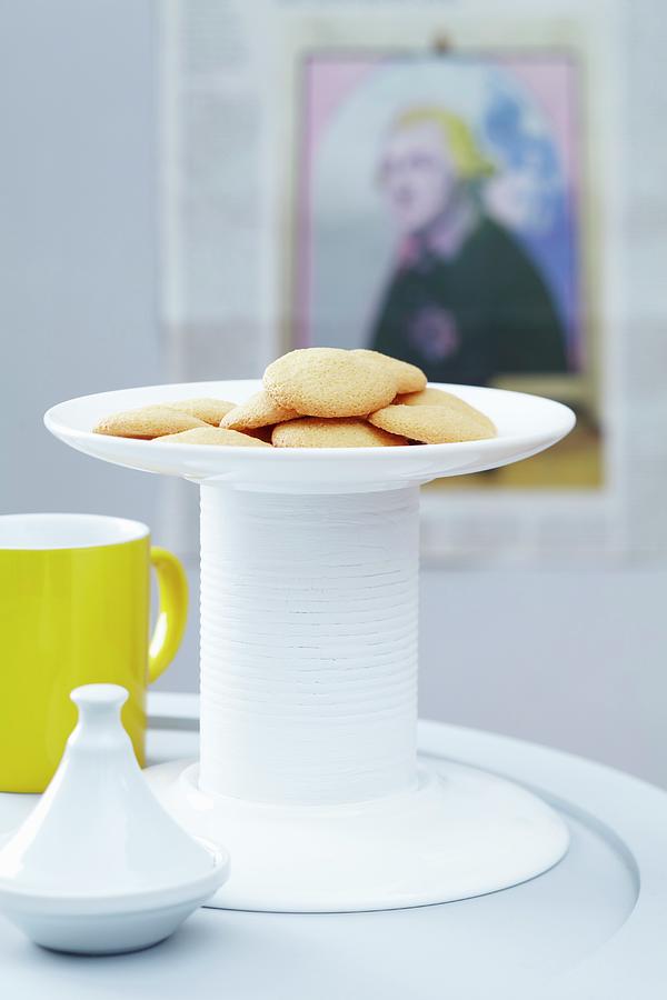 A Homemade Cake Stand Made From Two Plates And A White-painted Tin Can Photograph by Franziska Taube