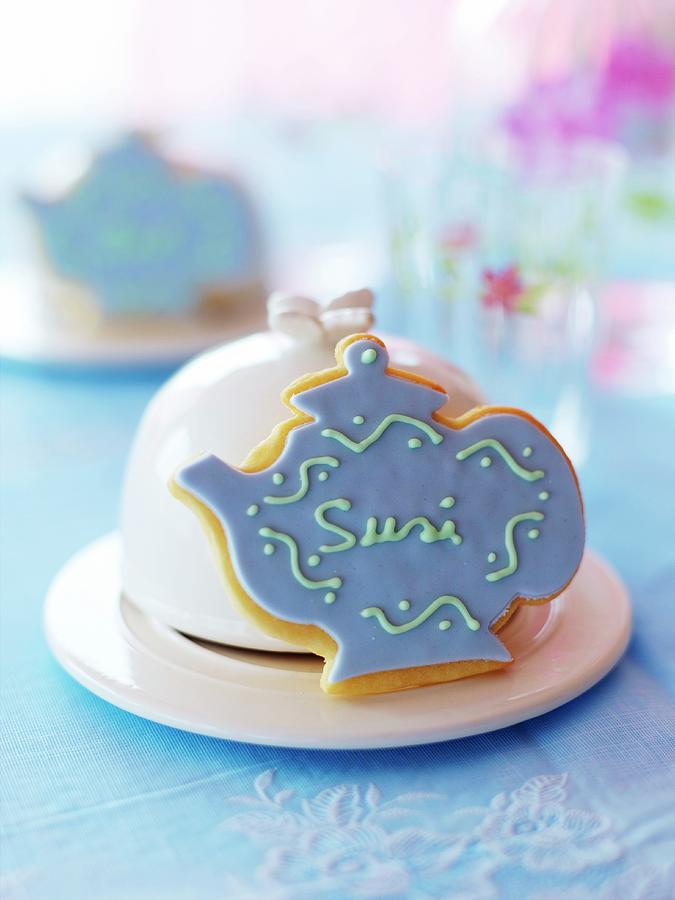 A Homemade Place Card Biscuits Shaped Like A Teapot Photograph by Jalag / Wolfgang Schardt