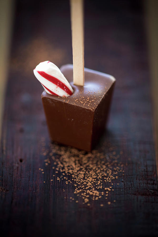 A Hot Chocolate Stick With A Piece Of Candy Cane Photograph by Eising Studio