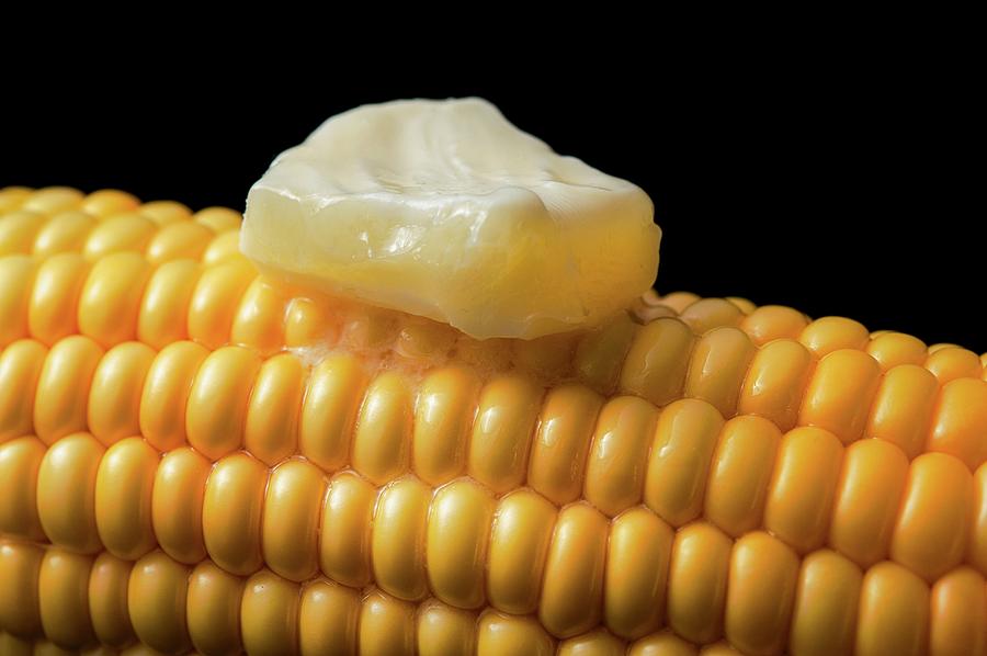 A Hot Corn Cob With Melting Butter Photograph by Paolo Lenzi