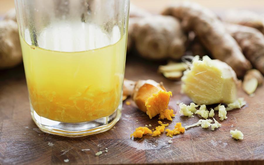 A Hot Ginger And Turmeric Drink Photograph by Cath Lowe