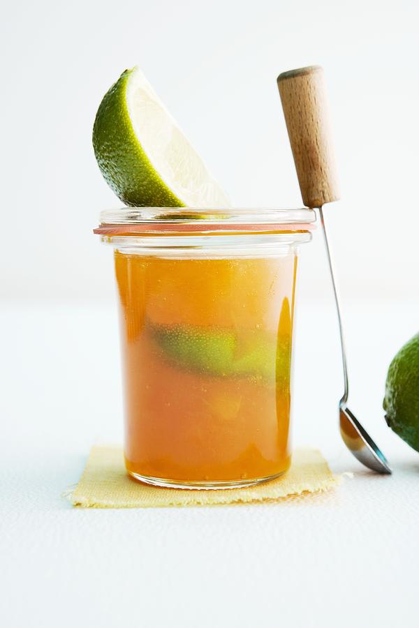 A Jar Of Apricot And Lime Marmalade Photograph by Michael Wissing