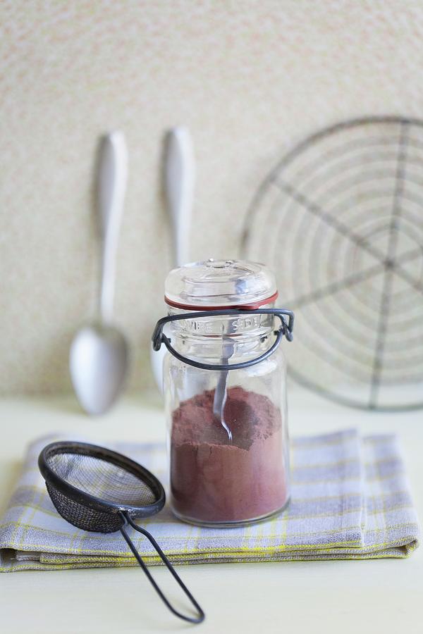A Jar Of Cocoa Powder Photograph by Martina Schindler