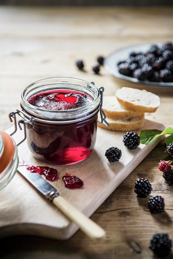 A Jar Of Home-made Blackberry Jam With Fresh Blackberries And Bread Photograph by Magdalena Hendey