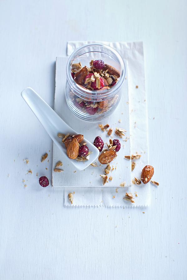 A Jar Of Mixed Nuts And Berries Photograph by Jalag / Stefan Bleschke