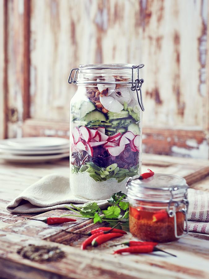 A Jar Of Oriental Radish Salad Photograph by Thorsten Kleine Holthaus