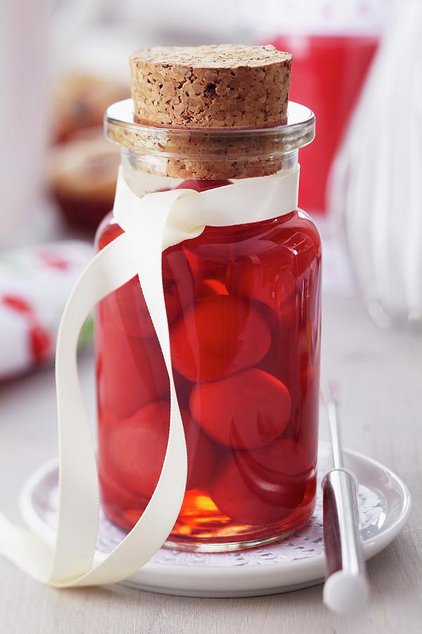 A Jar Of Preserved Sweet Cherries Photograph by Taube, Franziska