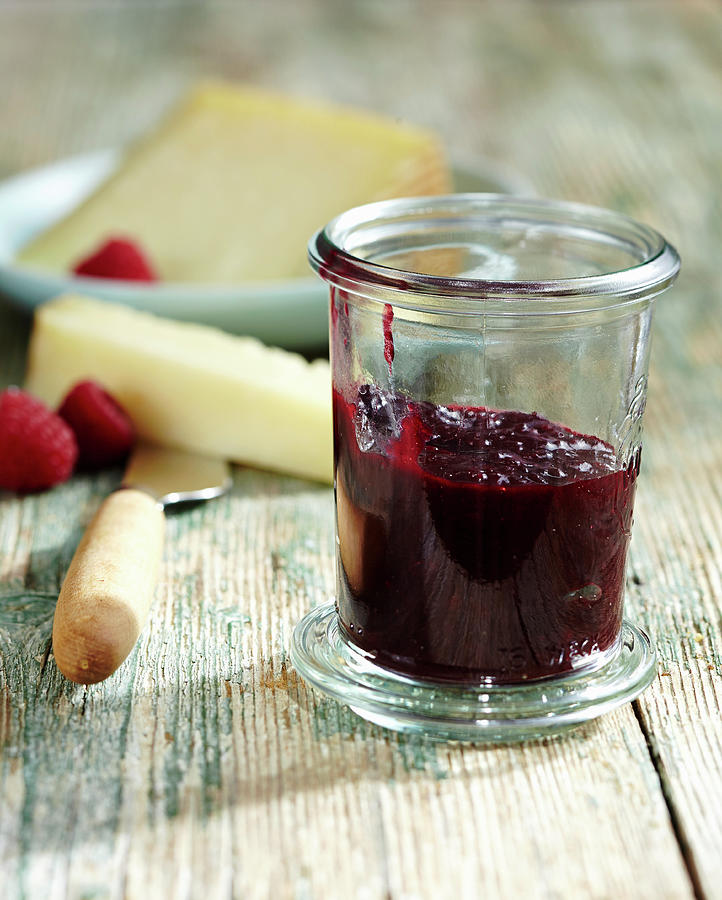 A Jar Of Raspberry Chutney With Cheese Photograph by Teubner Foodfoto