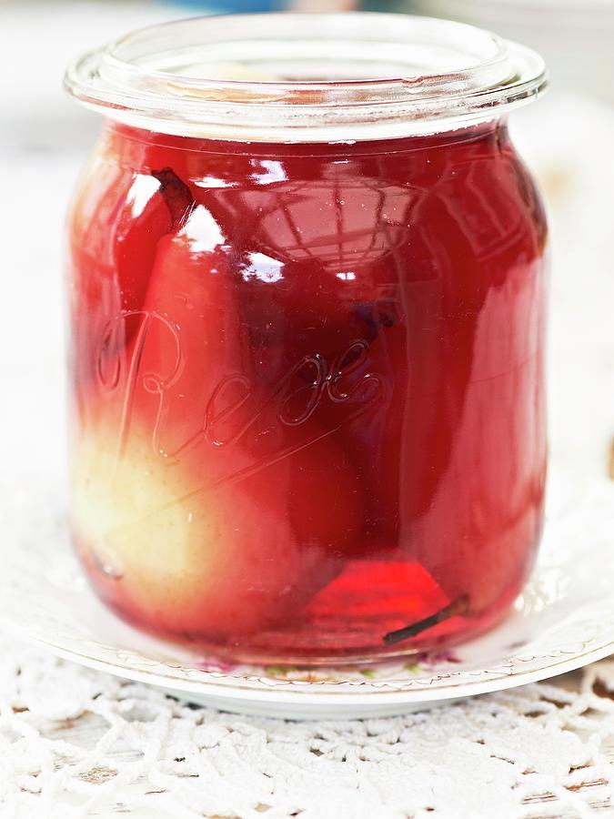 A Jar Of Red Wine Pears Photograph by Hannah Kompanik