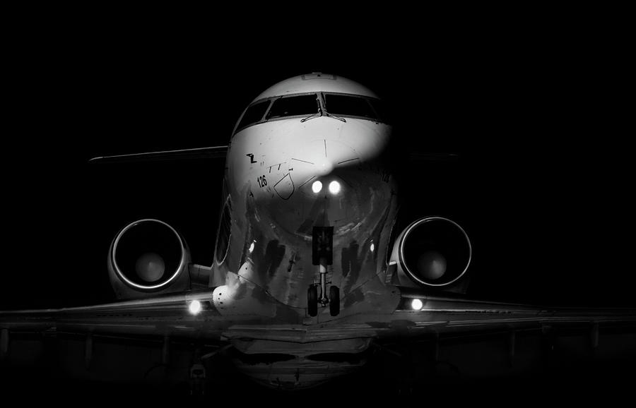 Transportation Photograph - A Jet On Final Approach To Toronto by Hans Neleman
