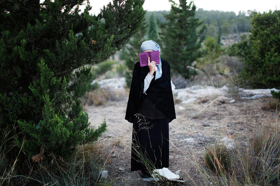 A Jewish Woman Prays During the Joint Photograph by Finbarr O'Reilly