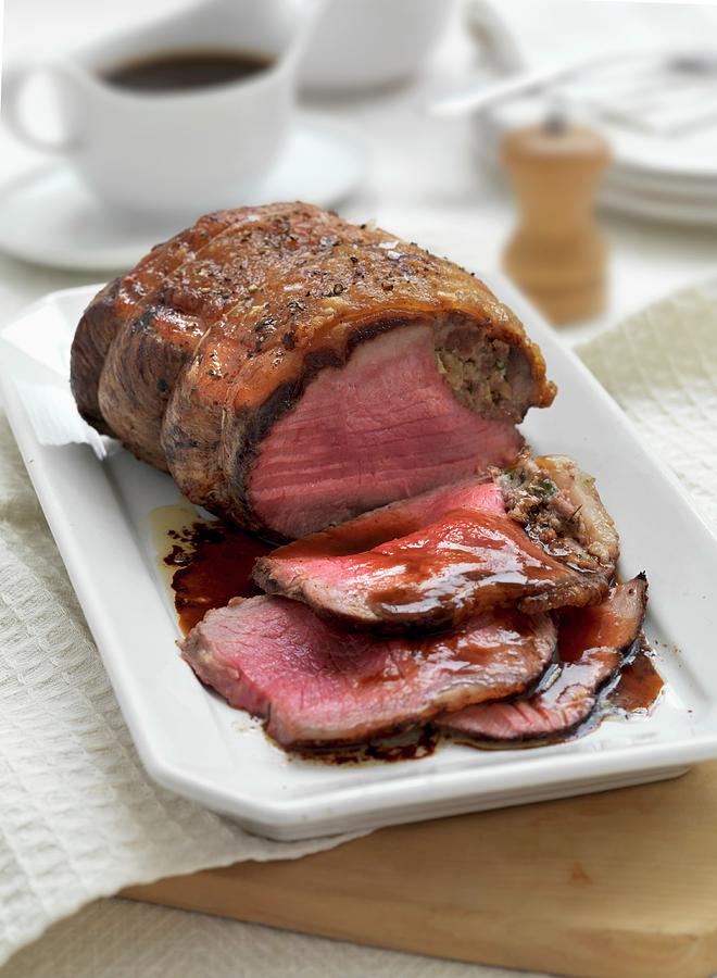 A Joint Of Roast Beef, Sliced Photograph by Hugh Johnson