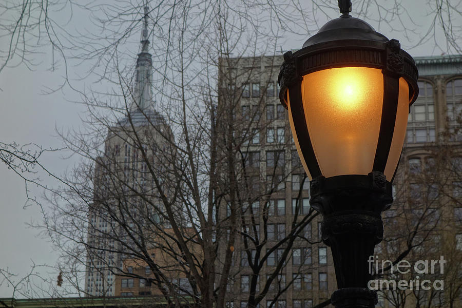 A Lamppost On A Wintry Evening Before The Empire State Building