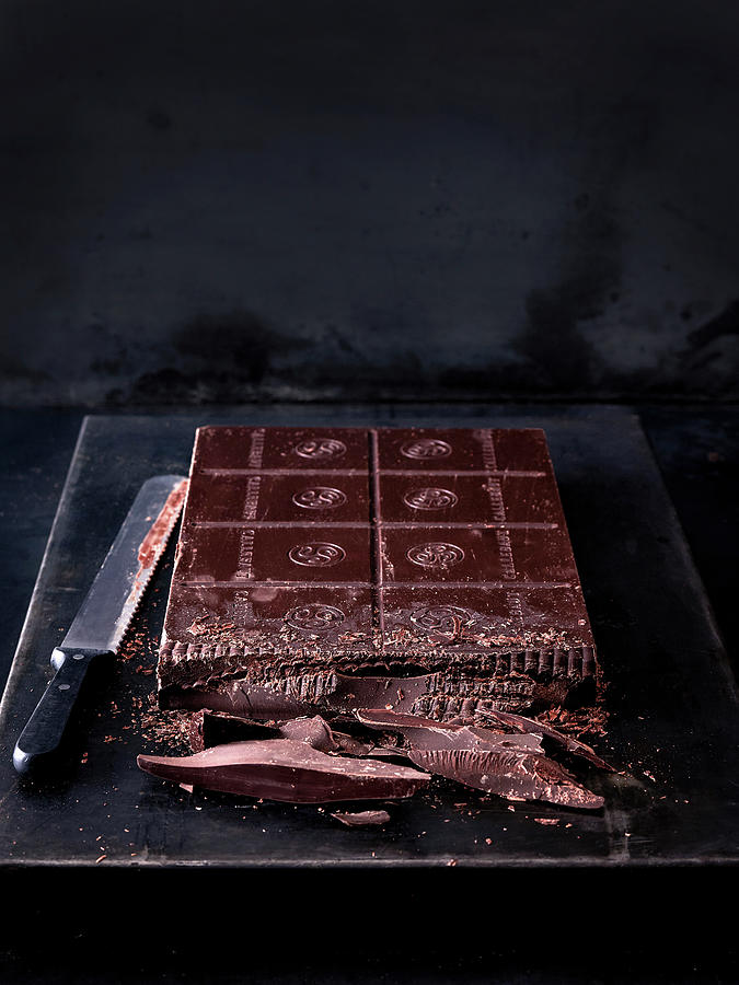 A Large Block Of Chocolate On A Black Baking Sheet Photograph by Sylvia Meyborg
