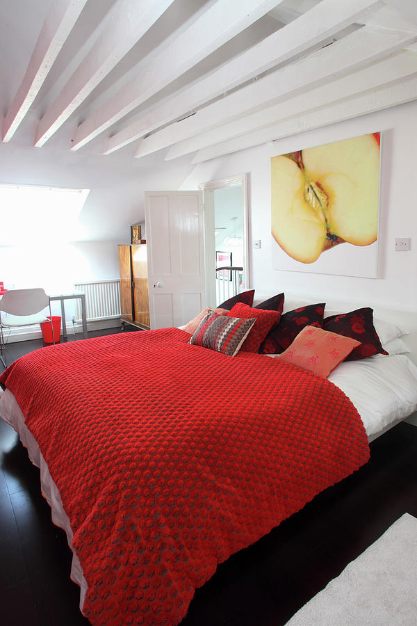 A Large Double Bed With A Red Quilt Photograph by Steven Morris Fine