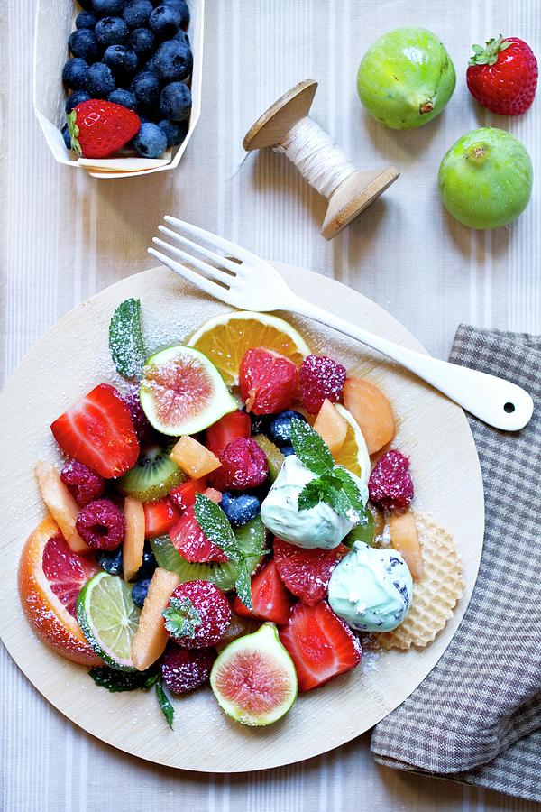 A Large Fruit Salad With Mint Ice Cream Photograph by Sjoberg, Marie