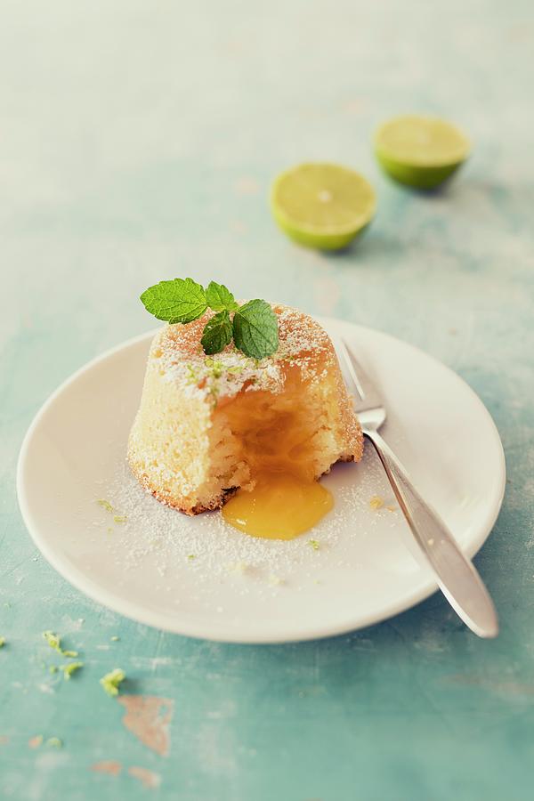A Lava Cake With Lemon Curd Photograph by Jan Wischnewski