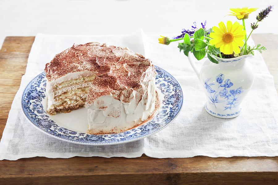 A Layered Coffee Cream Cake, Sliced Photograph by Danny Lerner