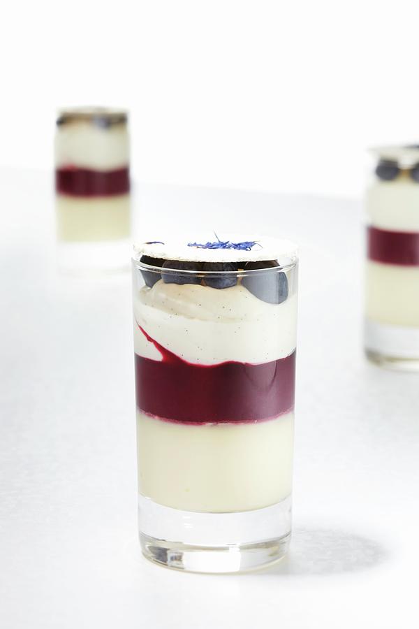 A Layered Dessert Of Blackcurrant Compote, Crme Brle, Mascarpone, Violets And Macaroon Photograph by Atelier Mai 98