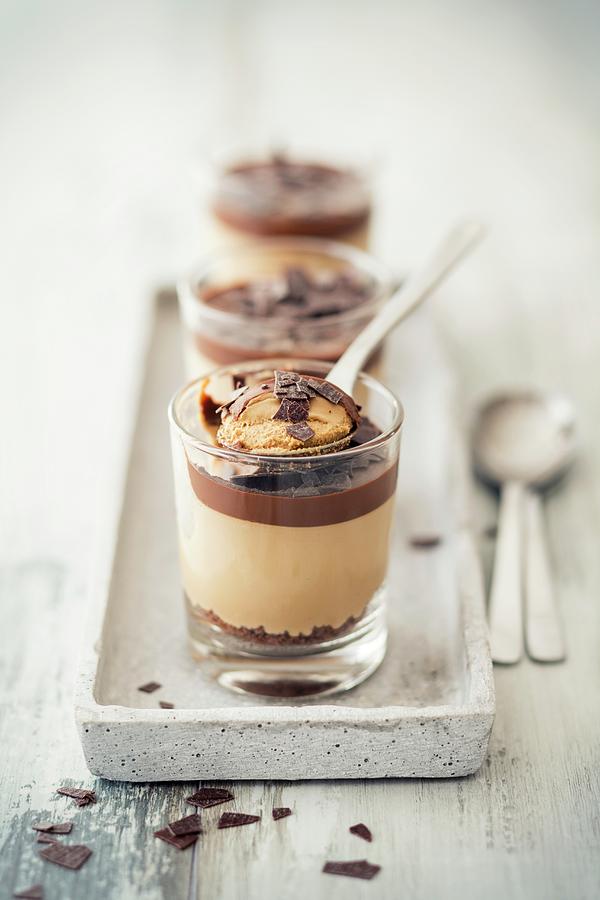 A Layered Dessert With Coffee Cream Photograph by Jan Wischnewski
