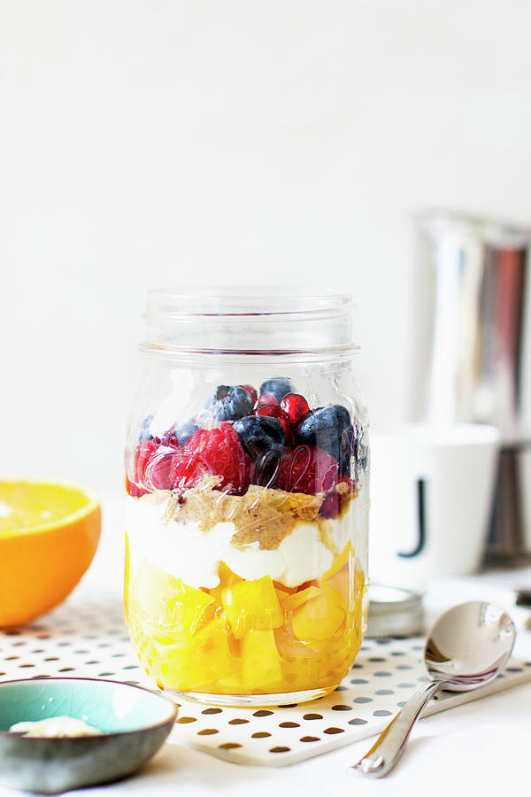 A Layered Dessert With Fruit In A Jar Photograph by Annalena Bokmeier