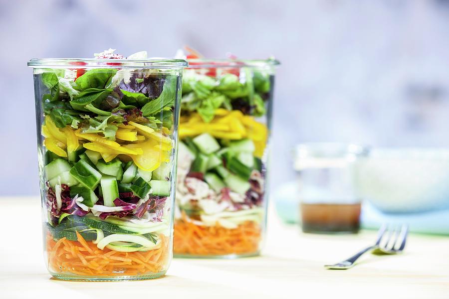 A Layered Vegetable Salad In A Glass Photograph by Younes Stiller