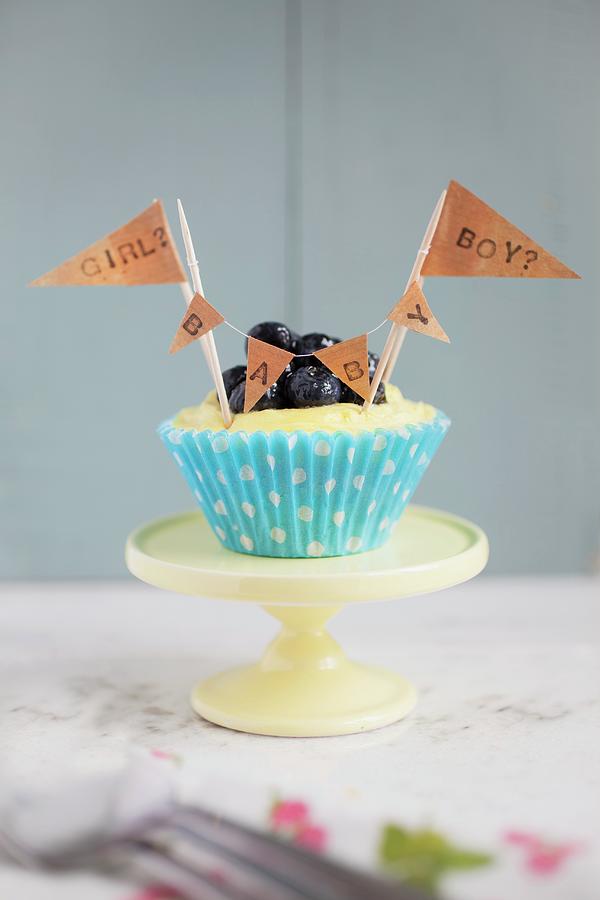 A Lemon And Blueberry Cupcake For A Baby Shower Photograph by Victoria Harley