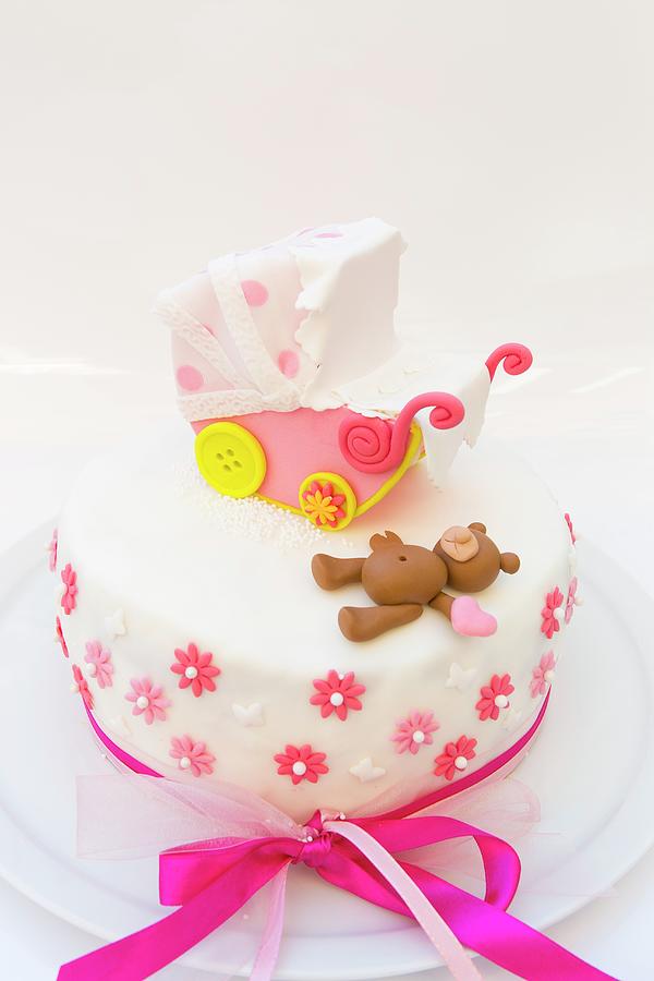 A Lemon Cake Decorated With A Pram And A Teddy Bear Photograph by Esther Hildebrandt