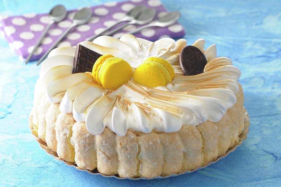 A Lemon Charlotte Topped With Meringue And Lemon Macaroons Photograph by Jean-christophe Riou