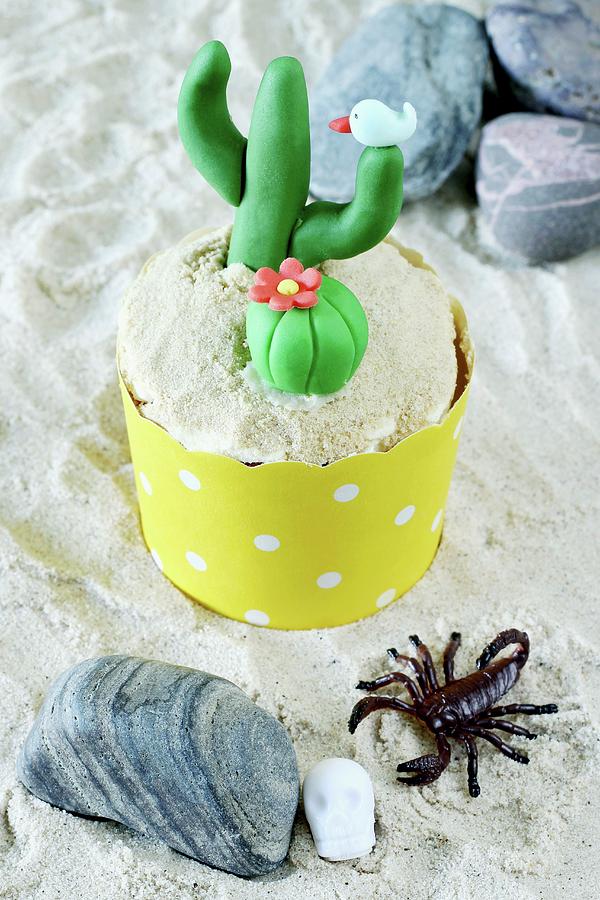A Lemon Cupcake Decorated With A Cactus Photograph by Philip Mowbray And Hercules Cakehouse