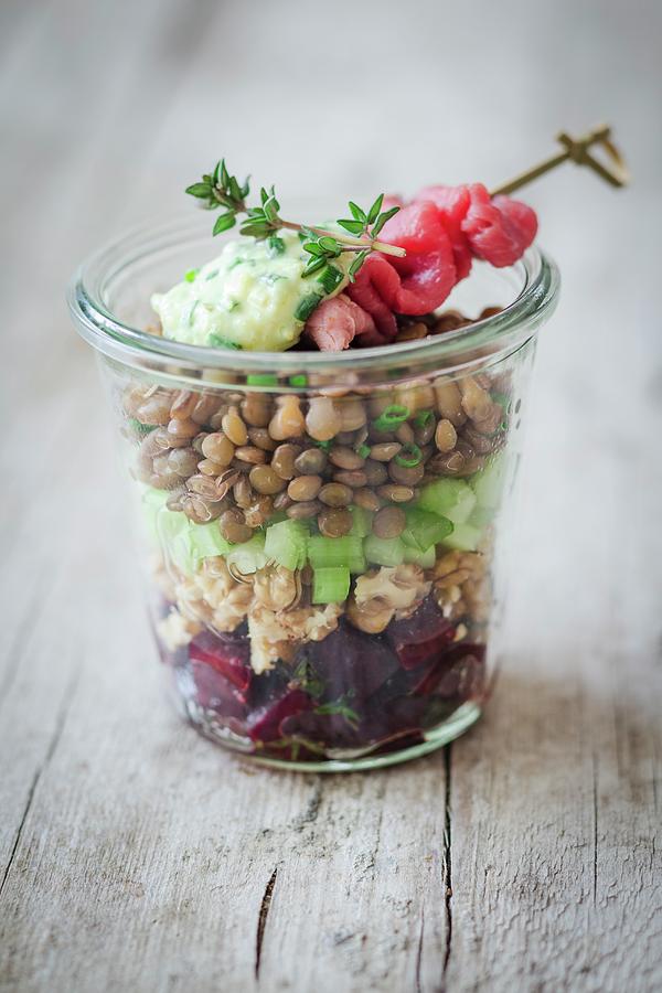 A Lentil Salad With Roast Beef And Beetroot In A Glass Jar Photograph by Jan Wischnewski