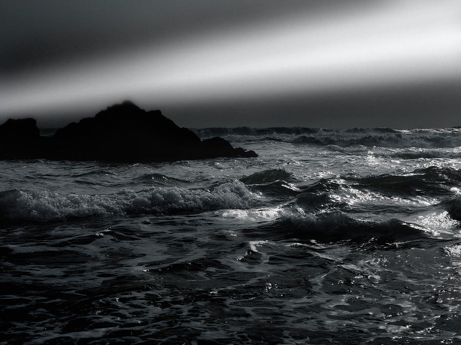 A Light Beam Over Rocky Shore And Water Photograph by Steven Puetzer