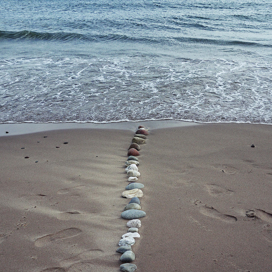 A Line Of Pebbles Arranged On The Photograph by Fiona Crawford Watson ...