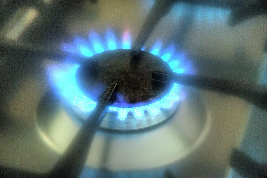 A Lit Ring On A Gas Hob close-up Photograph by Kaktusfactory