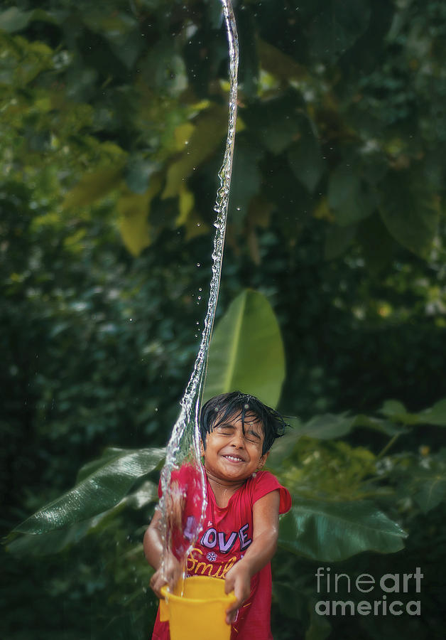 A little girl having fun with water Photograph by Partha Dalal - Fine ...