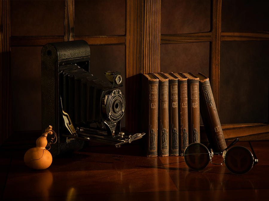 Still Life Photograph - A Little Gourd With Camera And Books by Wendy Xu