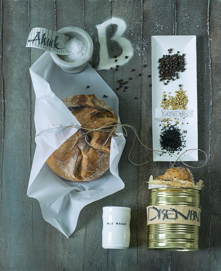 A Loaf Of Bread, Canned Bread And Various Spices Photograph by Bchner & Schmidt