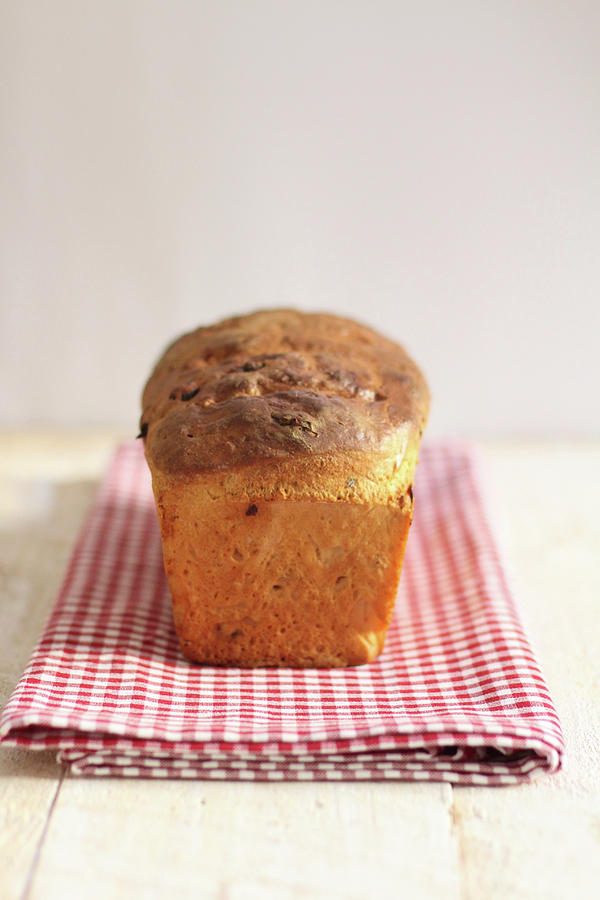 A Loaf Of Bread On A Tea Towel Photograph by Sylvia E.k Photography
