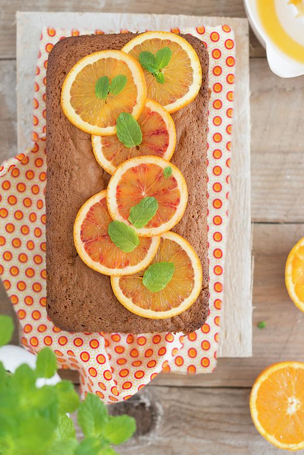 A Loaf-shaped Orange Cake seen From Above Photograph by Sonia Chatelain
