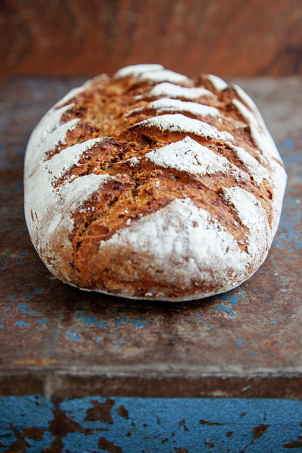 A Long Loaf Of Sour Dough Bread Photograph by Julia Skowronek
