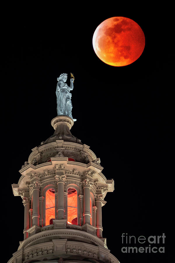 Austin Photograph - A Lunar eclipse, Super blood wolf moon glows over the Austin, Te by Dan Herron