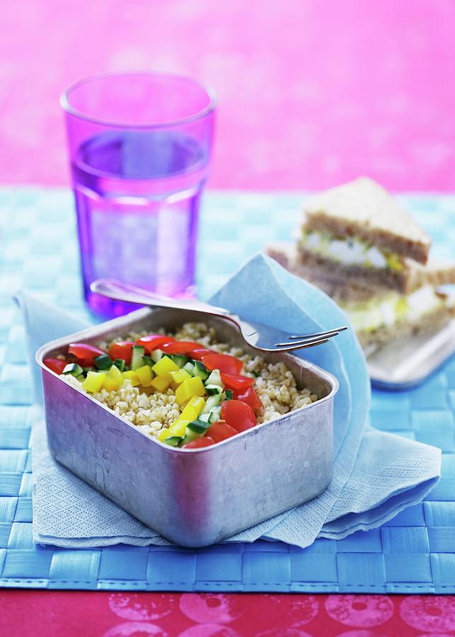 A Lunchbox Filled With Grains And Vegetables Photograph by Mikkel Adsbl