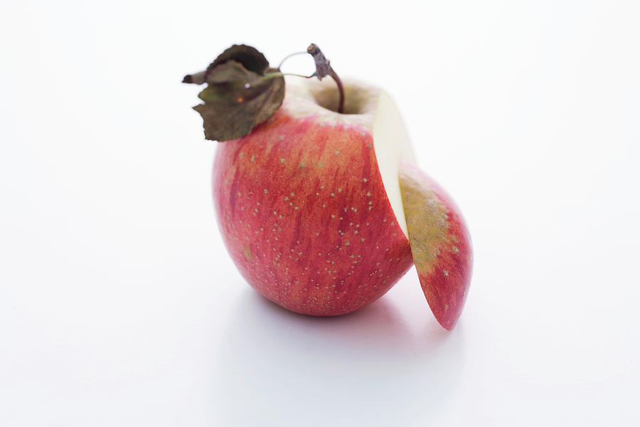 A Magenta Apple, Sliced Photograph by Michael Wissing