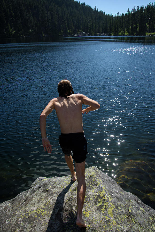 Washington Photograph - A Man Jumps Into An Alpine Lake by Jaime Boddorff Washington Photograph - A Man Jumps Into An Alpine Lake by Jaime Boddorff